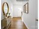 Bright foyer with hardwood floors, a mirror, and an elegant console table at 3743 Charles Nw St, Conover, NC 28613