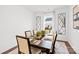 Formal dining room with hardwood floors and a wood table for six at 3892 Maxwell Henry Nw Ln, Conover, NC 28613