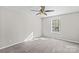 Spacious bedroom with carpeted floors and ceiling fan at 608 Pleasant Ave, Kannapolis, NC 28081