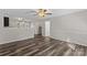 Living room featuring hardwood floors and neutral walls at 608 Pleasant Ave, Kannapolis, NC 28081