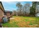 Large backyard with fenced area and trees at 6584 Forest Creek Dr, Denver, NC 28037