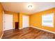 Spacious bedroom with hardwood floors and neutral walls at 6584 Forest Creek Dr, Denver, NC 28037