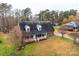 Brick home with a large front yard and mature trees at 6584 Forest Creek Dr, Denver, NC 28037