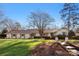 Ranch style home with landscaped yard and walkway at 946 Scotch Dr, Gastonia, NC 28054