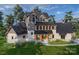 Two-story craftsman style home with stone accents and a metal roof at 0 S Potter Rd # 2B, Waxhaw, NC 28173