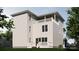 Rear view of a two-story home with white siding and a deck at 155A Lookout Dam Rd, Statesville, NC 28625