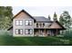 Two-story home with back patio, stone fireplace and balcony at 156A Lookout Dam Rd, Statesville, NC 28625
