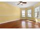Spacious bedroom featuring hardwood floors, and a cheerful yellow color scheme at 301 Wilson N St, Rock Hill, SC 29730