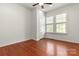 Simple bedroom with hardwood floors and two windows at 301 Wilson N St, Rock Hill, SC 29730
