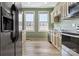 Kitchen with light beige cabinets and modern appliances at 301 Wilson N St, Rock Hill, SC 29730