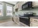 Modern kitchen features updated cabinetry, stainless steel appliances, and light flooring at 301 Wilson N St, Rock Hill, SC 29730