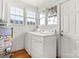 Laundry room with washer, dryer, and ample storage at 301 Wilson N St, Rock Hill, SC 29730