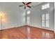 Large bedroom with hardwood floors and plantation shutters at 312 Garnet Ct, Fort Mill, SC 29708