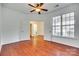 Bright bedroom with hardwood floors, double door closet, and access to laundry at 312 Garnet Ct, Fort Mill, SC 29708
