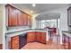Kitchen with dark wood cabinets, granite countertops, and a breakfast bar at 312 Garnet Ct, Fort Mill, SC 29708