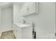 Laundry room with washer, dryer, and cabinets at 312 Garnet Ct, Fort Mill, SC 29708