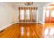 Formal dining room with hardwood floors and large windows at 505 Liledoun Rd, Taylorsville, NC 28681