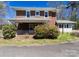 Brick home with a porch and side entrance at 505 Liledoun Rd, Taylorsville, NC 28681