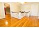 Upper hallway with hardwood floors and patterned wallpaper at 505 Liledoun Rd, Taylorsville, NC 28681
