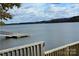 Serene lake view from a private dock, perfect for relaxation at 565 Shore Acres Rd, Salisbury, NC 28146