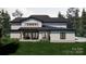 Two story home with back deck and white siding at 0 S Potter Rd # 2A, Waxhaw, NC 28173