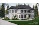 Two-story house with a three car garage and landscaping at 0 S Potter Rd # 2A, Waxhaw, NC 28173