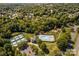 Aerial view of community amenities including pool, tennis courts, and playground at 10319 Dominion Village Dr, Charlotte, NC 28269