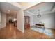 Bright dining room with hardwood floors and home office area at 10319 Dominion Village Dr, Charlotte, NC 28269