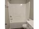 Clean bathroom featuring a shower/tub combo and white fixtures at 1174 Plaza Walk Dr, Charlotte, NC 28215
