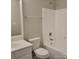 Clean bathroom with a white tub/shower, toilet, and vanity at 1174 Plaza Walk Dr, Charlotte, NC 28215