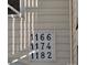 Close-up of building numbers 1166, 1174, 1182 at 1174 Plaza Walk Dr, Charlotte, NC 28215
