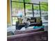 Comfortable seating area overlooking the pool at 1174 Plaza Walk Dr, Charlotte, NC 28215