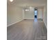 Spacious dining room with hardwood floors and lots of natural light at 1174 Plaza Walk Dr, Charlotte, NC 28215