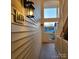 Exterior walkway with light fixtures and building view at 1174 Plaza Walk Dr, Charlotte, NC 28215