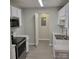 Modern kitchen with stainless steel appliances and pantry at 1174 Plaza Walk Dr, Charlotte, NC 28215