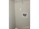 Laundry closet with hookups and shelving at 1174 Plaza Walk Dr, Charlotte, NC 28215