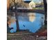 Serene pond view with mature trees and wildlife at 1174 Plaza Walk Dr, Charlotte, NC 28215