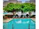 Inviting community pool with plenty of lounge chairs at 1174 Plaza Walk Dr, Charlotte, NC 28215