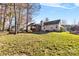 House exterior with a screened porch and backyard view at 13217 Peacock Ln, Charlotte, NC 28215