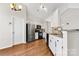 Modern kitchen with stainless steel appliances and granite countertops at 13217 Peacock Ln, Charlotte, NC 28215