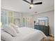 Bright bedroom with a king-size bed, and large windows at 224 N Poplar St # 16, Charlotte, NC 28202