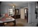 Spacious bedroom with a post bed and dresser at 306 Mcadenville Rd, Lowell, NC 28098