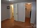 Bedroom with wood floors and en suite bathroom and closet at 306 Mcadenville Rd, Lowell, NC 28098
