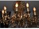 Elegant crystal chandelier with candle-style lights at 306 Mcadenville Rd, Lowell, NC 28098