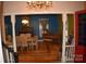 Elegant dining room with hardwood floors and a crystal chandelier at 306 Mcadenville Rd, Lowell, NC 28098