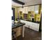 Bright kitchen with ample cabinetry and a spacious island at 306 Mcadenville Rd, Lowell, NC 28098