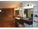 Two hair styling stations with mirrors and ample storage at 306 Mcadenville Rd, Lowell, NC 28098
