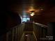 View from the top of the stairs to the lower level at 41 Aaron Ct, Taylorsville, NC 28681