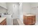 Bright laundry room with utility sink and extra storage at 467 Granite Lake Ct, Denver, NC 28037