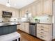 Kitchen boasts granite countertops and custom cabinetry at 5129 Little Brook Ln, Charlotte, NC 28226